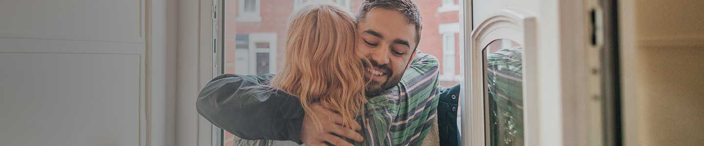 Two people hugging
